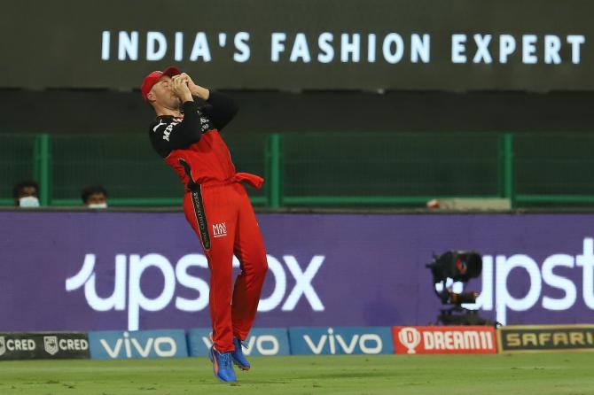 AB de Villiers takes the catch to dismiss Priyam Garg.