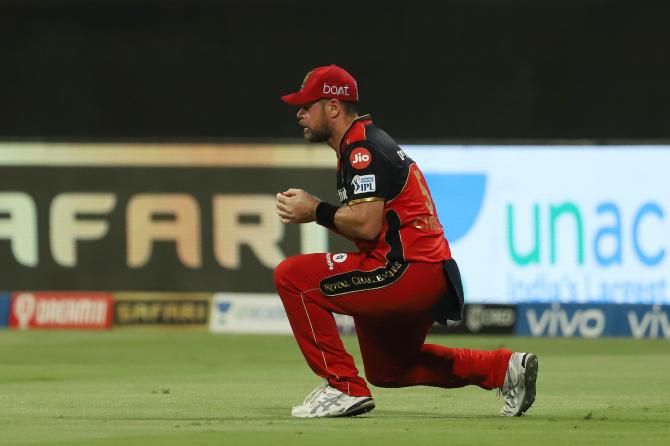 Dan Christian takes the catch to dismiss Jason Holder.