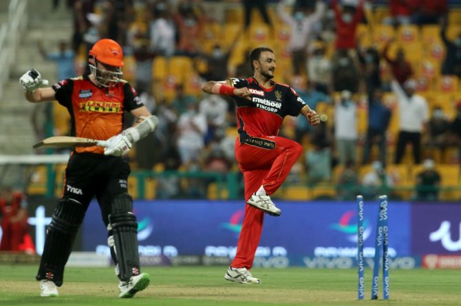Harshal Patel celebrates after bowling Kane Williamson.