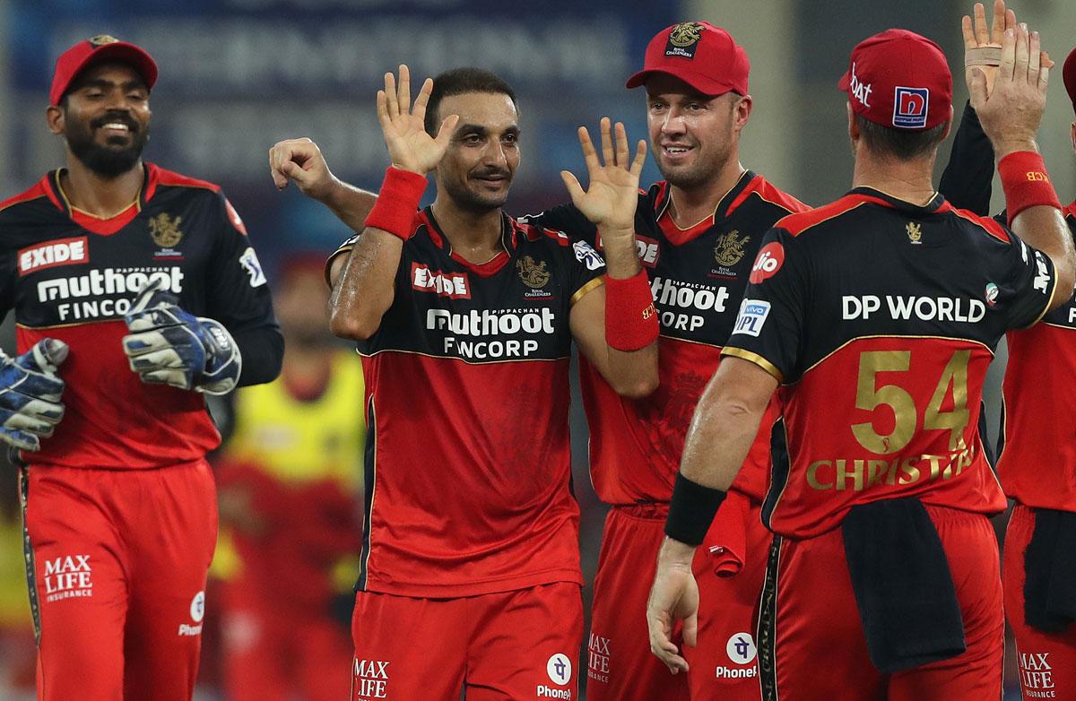 Harshal Patel celebrates the wicket of Shikhar Dhawan.