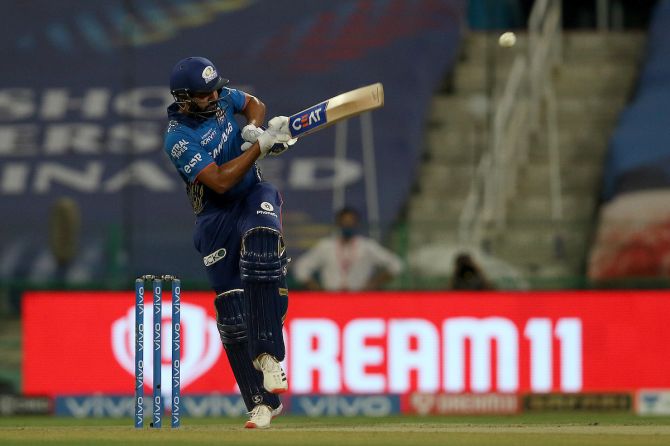 umbai Indians captain Rohit Sharma swivels on one foot to send the ball to the boundary.