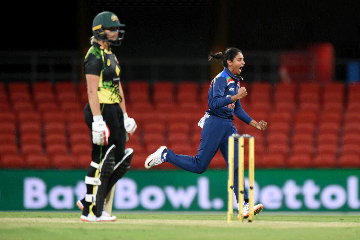 India's Harmanpreet Kaur celebrates the wicket of Australia's Ashleigh Gardner during game two of the International Women's T20 series at Metricon Stadium in Gold Coast on Saturday