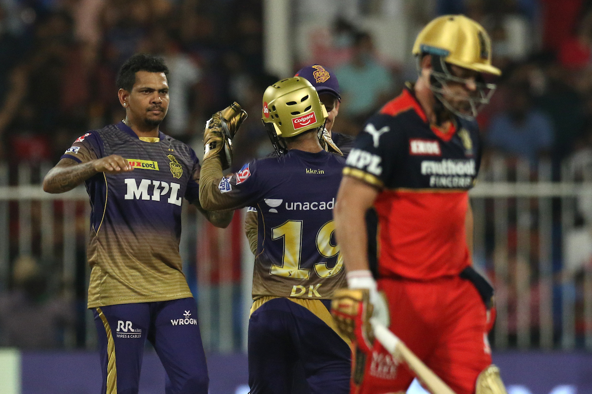 Sunil Narine is congratulated by his Kolkata Knight Riders teammates after dismissing A B de  Villiers.