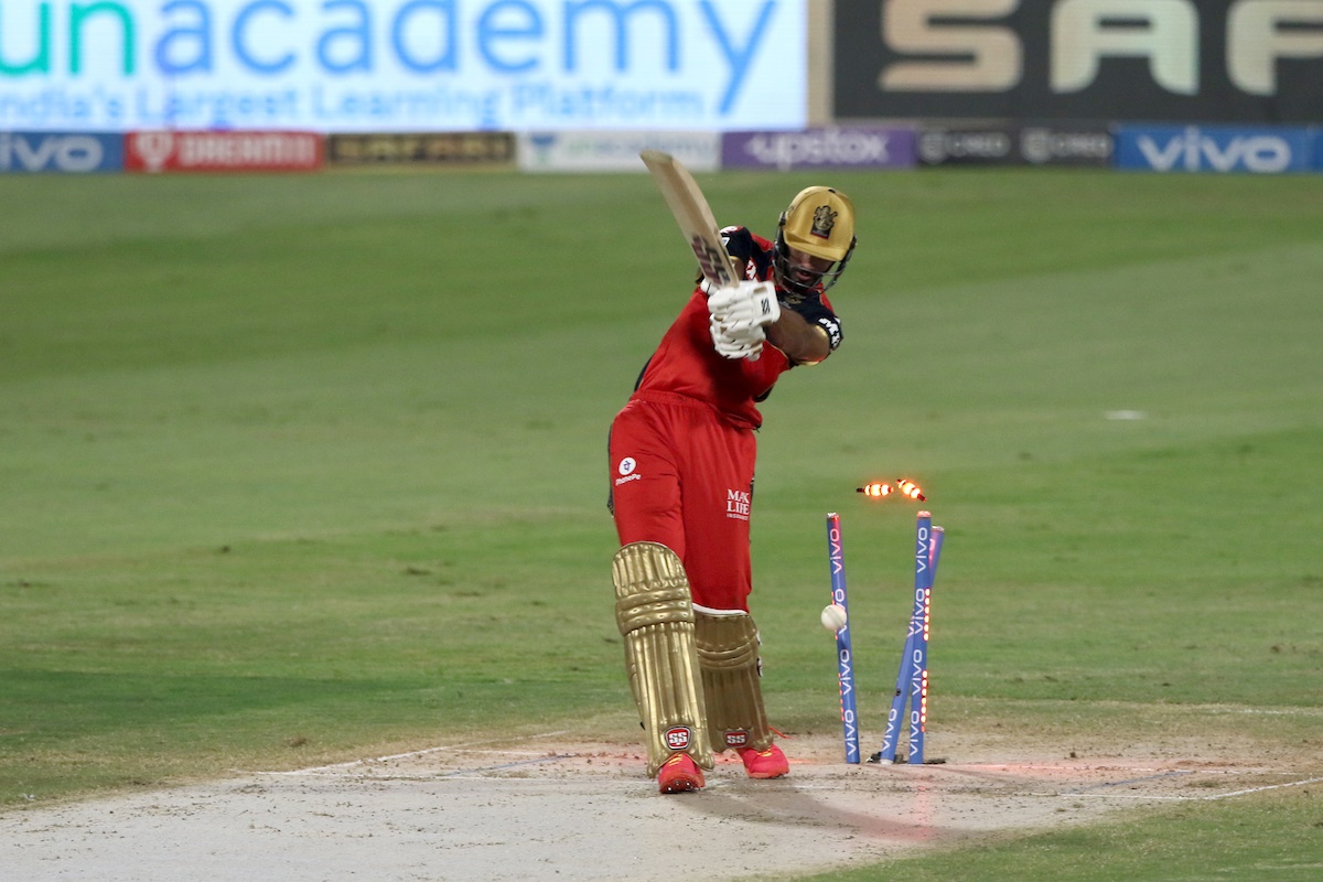 Royal Challengers Bangalore opener Devdutt Padikkal is bowled by Lockie Ferguson.