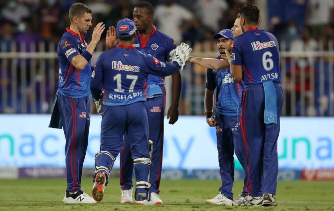 Delhi Capitals pacer Kagiso Rabada celebrates the wicket of Venkatesh Iyer.