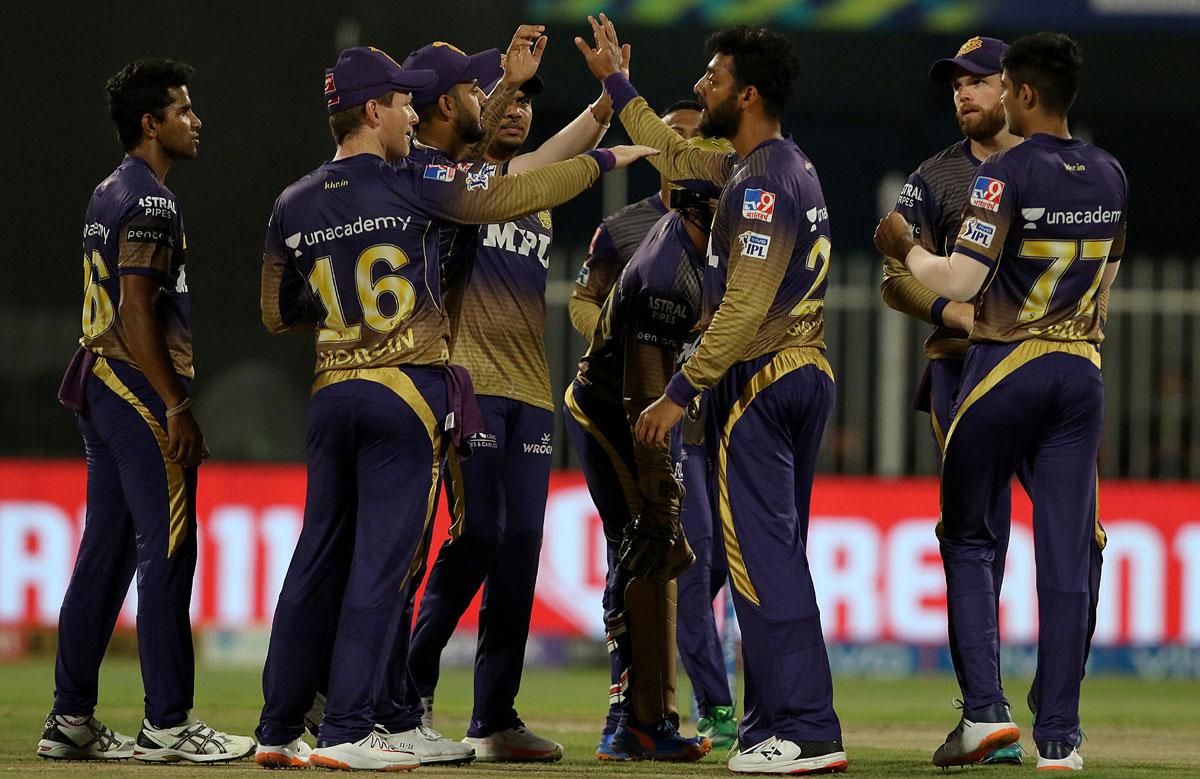 Varun Chakaravarthy is congratulated by his Kolkata Knight Riders teammates after dismissing Delhi Capitals opener Prithvi Shaw.