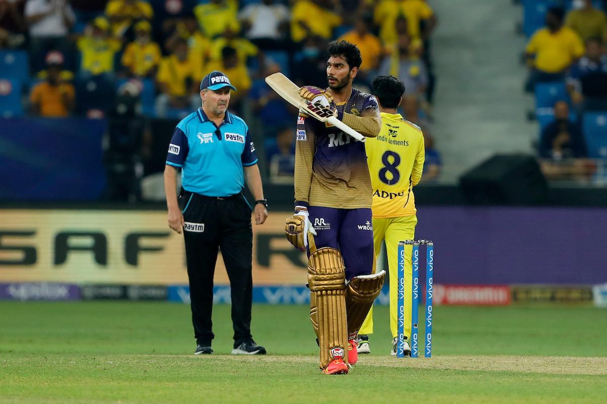 Venkatesh Iyer reacts after completing his 50.