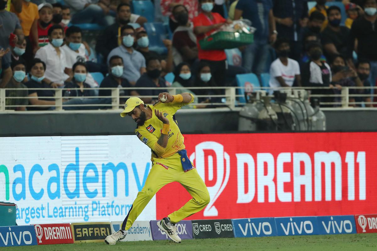 Ravindra Jadeja makes sure he does not step on the boundary rope after catching Sunil Narine.