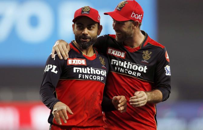 Royal Challengers Bangalore's Glenn Maxwell with captain Virat Kohli