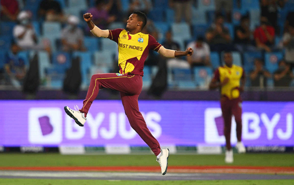 West Indies' Akeal Hosein celebrates after pocketing a blinder to dismiss England's Liam Livingstone