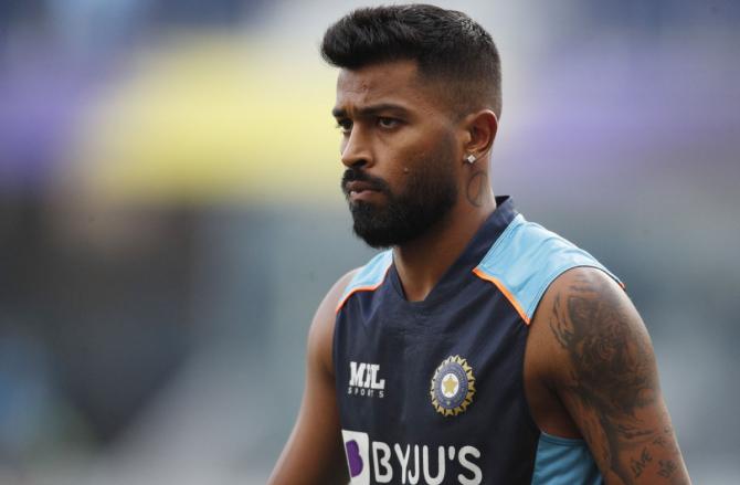 India's Hardik Pandya warms-up ahead of the T20 World Cup match against Pakistan in Dubai on Sunday.