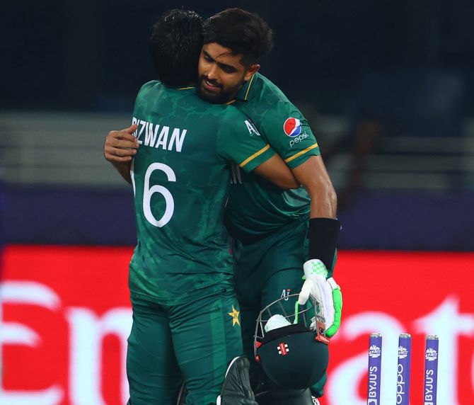 Pakistan Openers Mohammed Rizwan and Babar Azam celebrate winning the match against India on Sunday