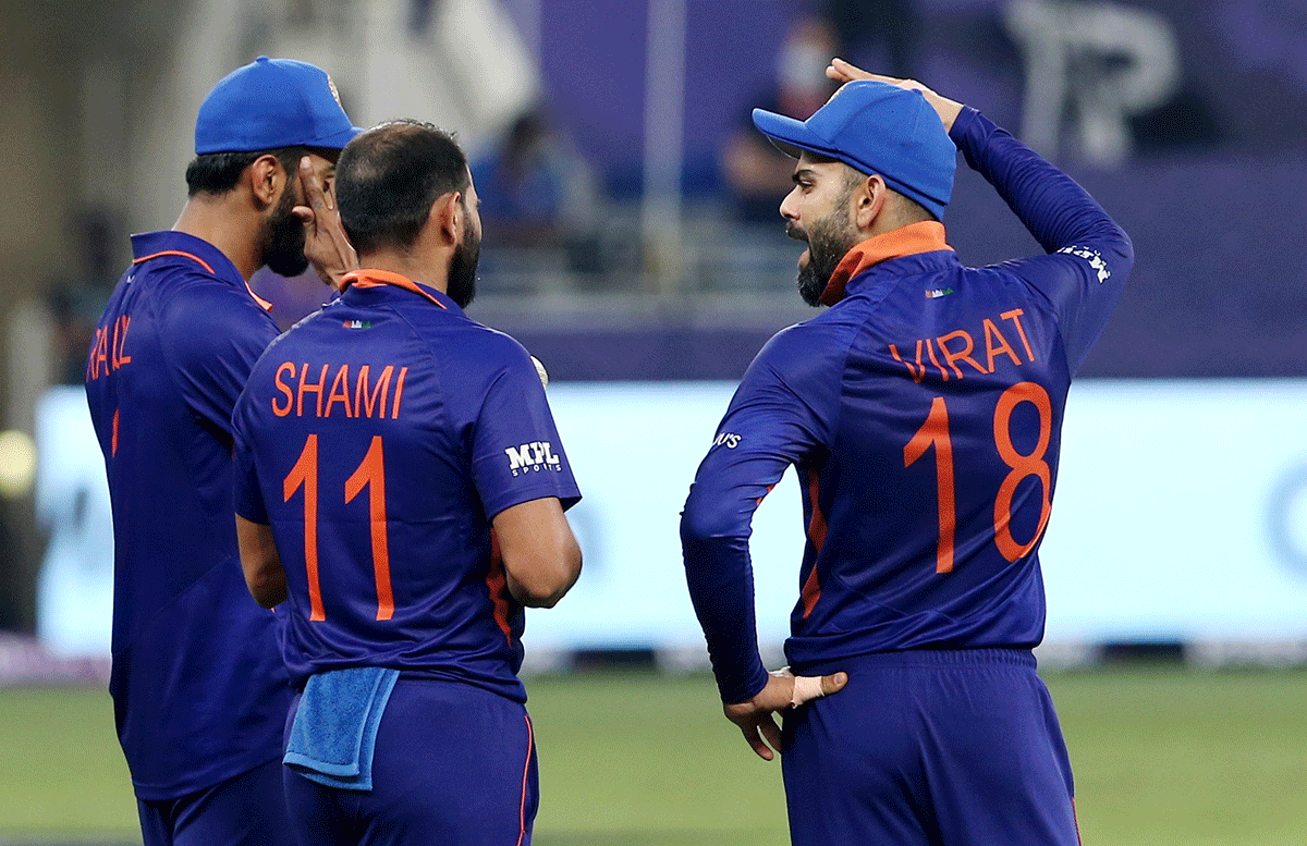 India's Virat Kohli speaks to Mohammad Shami and KL Rahul during the match. India play their next match against New Zealand on Sunday and Kohli felt the break would do a world of good to his side, who had a fair idea about the grey areas they needed to work on.