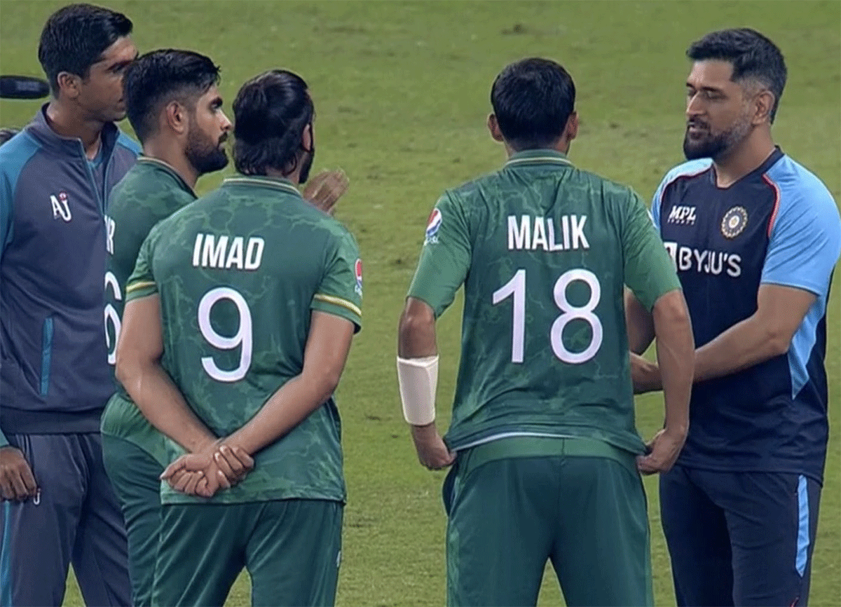 A screengrab of Mahendra Singh Dhoni chatting with Pakistan players after the match on Sunday