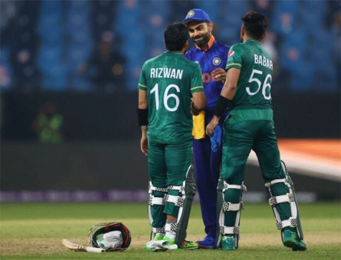 Virat Kohli congratulates Mohammad Rizwan and Babar Azam after the match. 'We never take any opposition lightly. Neither do we differentiate between oppositions, that's how we play our cricket'