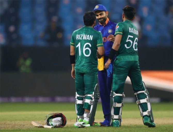 Virat Kohli congratulates Mohammad Rizwan and Babar Azam after the match on Sunday