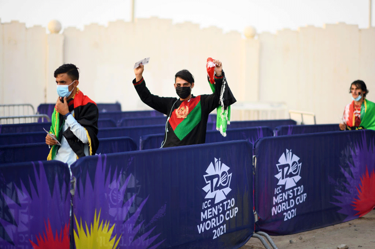 Fans of Afghanistan arrive ahead of the ICC Men's T20 World Cup match against Scotland at Sharjah Cricket Stadium in Sharjah on Monday