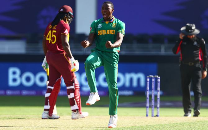 South Africa pacer Kagiso Rabada celebrates the wicket of Lendl Simmons.