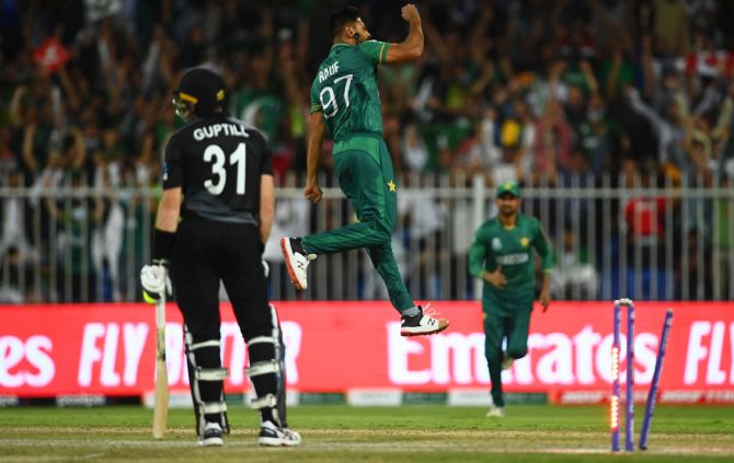 Pakistan's Haris Rauf celebrates after dismissing New Zealand opener Martin Guptill. 