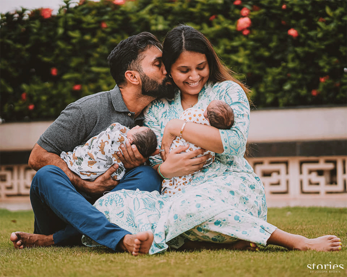 Dinesh Karthik kisses wife Dipika Pallikal with their twin boys Kabir and Zain