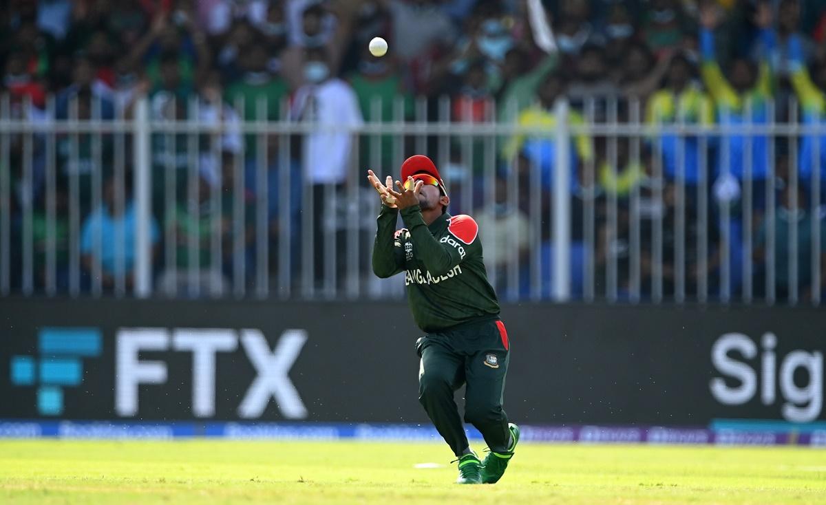 Mushfiqur Rahim takes the catch to dismiss Evin Lewis.