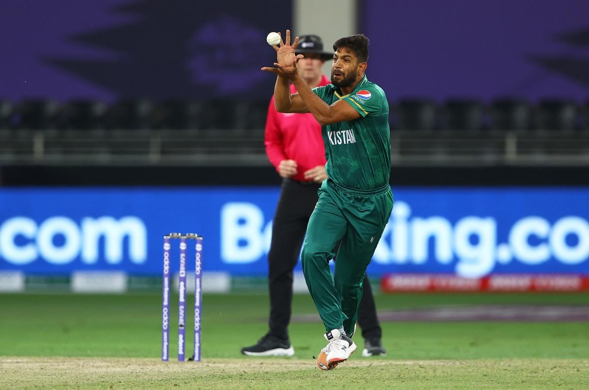 Haris Rauf takes the catch off his own bowling to dismiss Asghar Afghan.