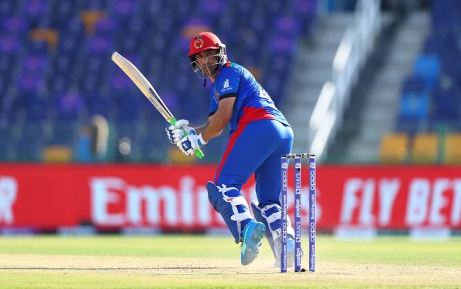 Asghar Afghan, in his farewell outing, hit 3 fours and a six in a 23-ball 31 to prop Afghanistan during the T20 World Cup Super 12s match against Namibia, at Sheikh Zayed stadium in Abu Dhabi, on Sunday.