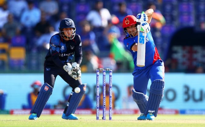 Asghar Afghan hit 3 fours and a six in a 23-ball 31 to prop Afghanistan during the T20 World Cup Super 12s match against Namibia, at Sheikh Zayed stadium in Abu Dhabi, on Sunday.