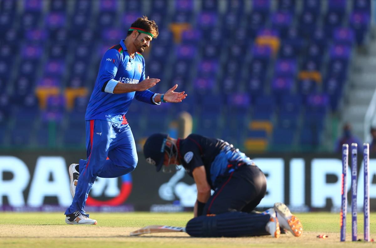 Hamid Hassan celebrates taking the wicket of Gerhard Erasmus.