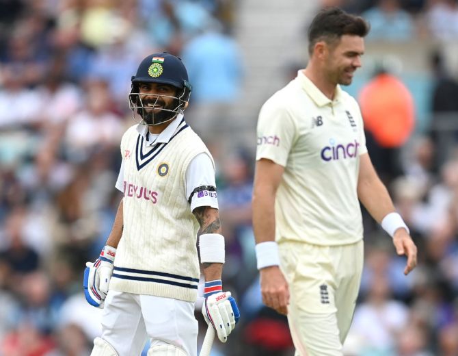 India captain Virat Kohli shares a light moment with James Anderson.