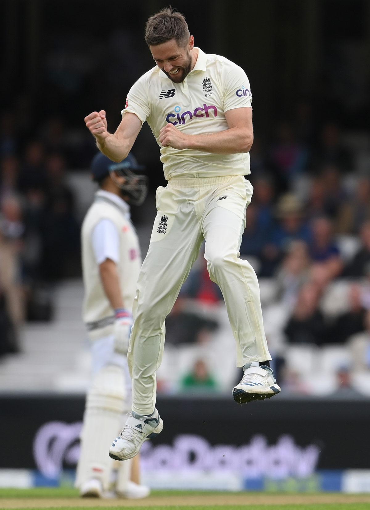 Chris Woakes celebrates after dismissing Ravindra Jadeja