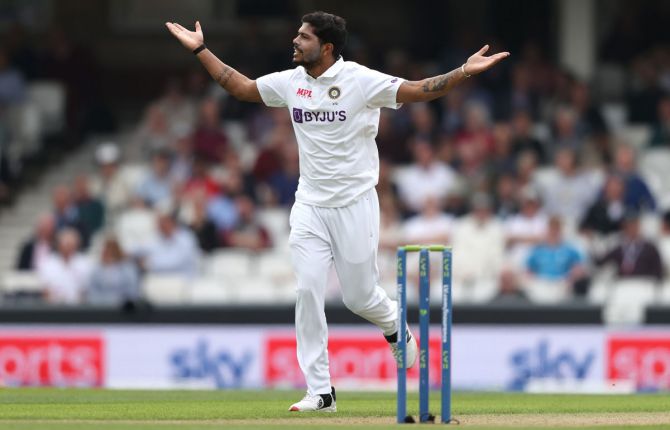 India pacer Umesh Yadav celebrates taking the wicket of Dawid Malan on Day 2 of the fourth Test at The Oval, on Friday.