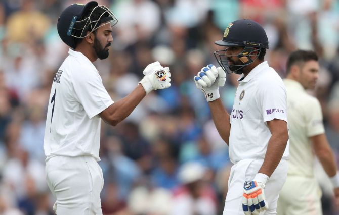 India openers Rohit Sharma and K L Rahul celebrate a boundary in the morning session on Day 3 of the fourth Test against England, at The Oval, on Saturday.