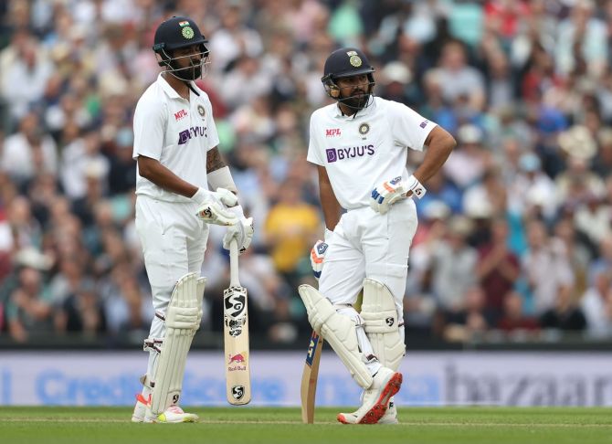 India openers K L Rahul, left, and Rohit Sharma wait for the review after the former is caught behind off England pacer James Anderson during Day 3 of the fourth Test, at The Kia Oval in London, on Saturday. 