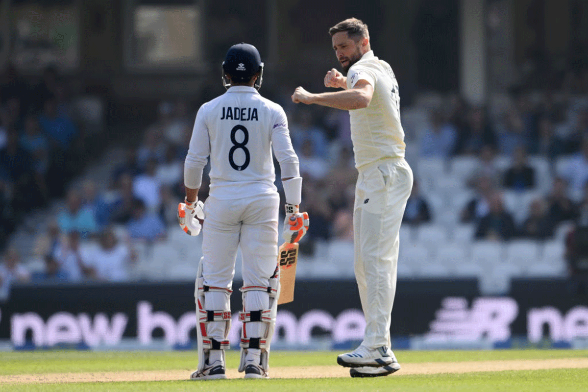 England pacer Chris Woakes celebrates after dismissing Ravindra Jadeja.