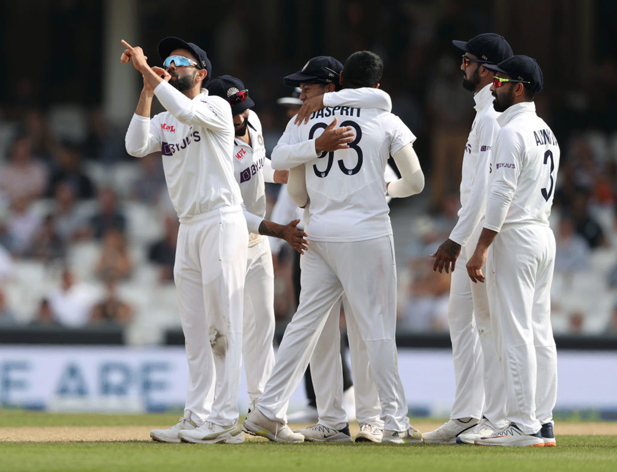 Indian captain Virat Kohli celebrates after Jasprit Bumrah dismisses England's Ollie Pope on Day 5 of the 4th Test at The Kia Oval in London on Monday