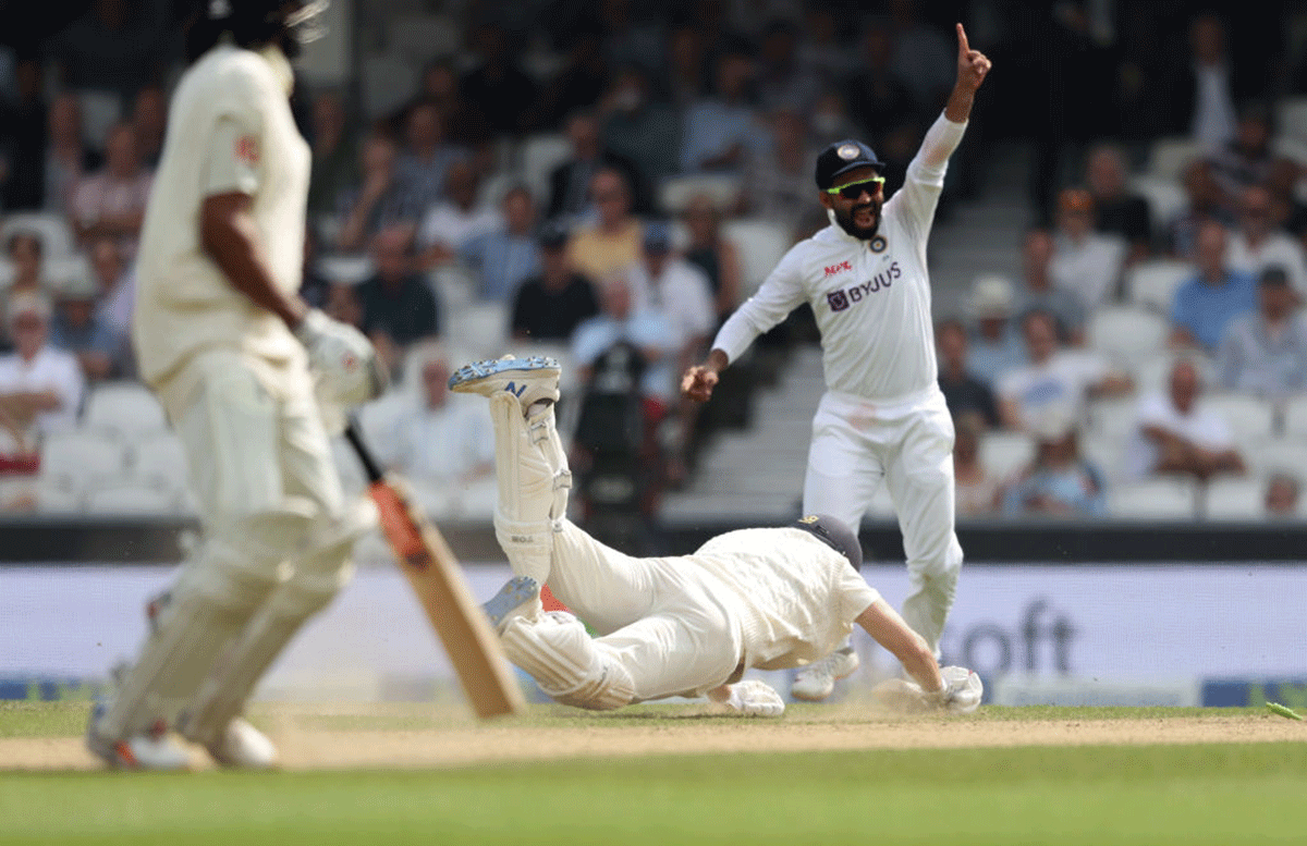 England's Dawid Malan fails to make his ground as India run him out