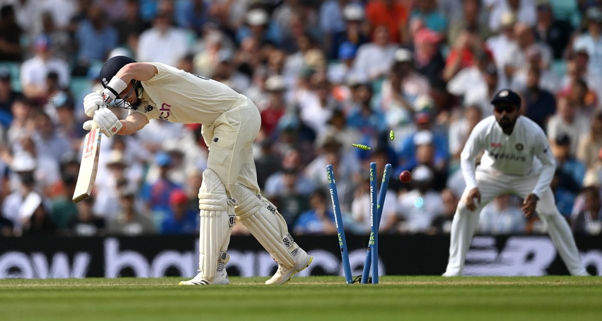 Ollie Pope is bowled by a yorker from Jasprit Bumrah