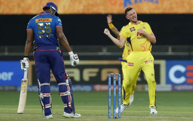 Josh Hazelwood reacts after taking the wicket of Kieron Pollard