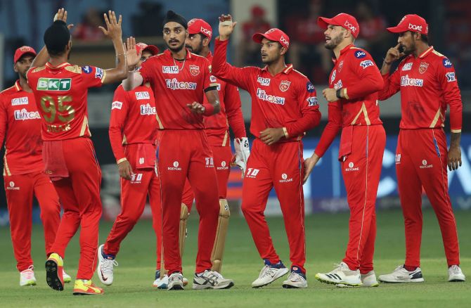 Punjab Kings pacer Arshdeep Singh celebrates the wicket of Rajasthan Royals opener Evin Lewis.