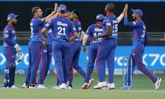 Delhi Capitals players celebrate after pacer Anrich Nortje dismisses Sunrisers Hyderabad opener David Warner during the Indian Premier League match in Dubai, on Wednesday.
