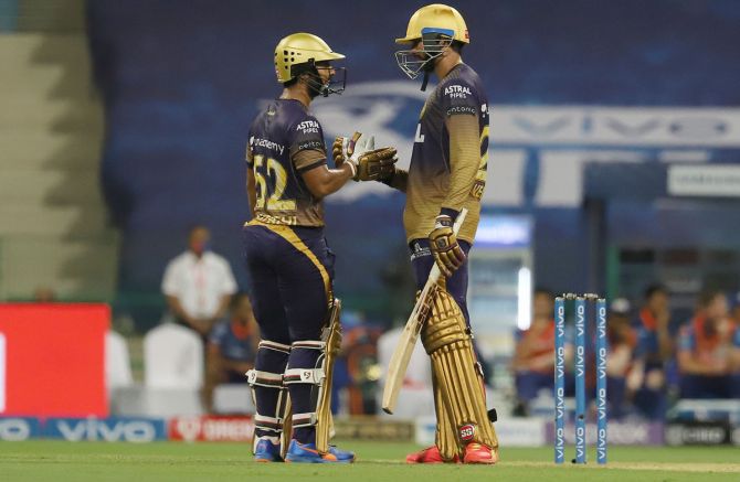 Rahul Tripathi is congratulated by his Kolkata Knight Riders teammate Venkatesh Iyer on completing 50 during the Indian Premier league match against Mumbai Indians , in Abu Dhabi, on Thursday.