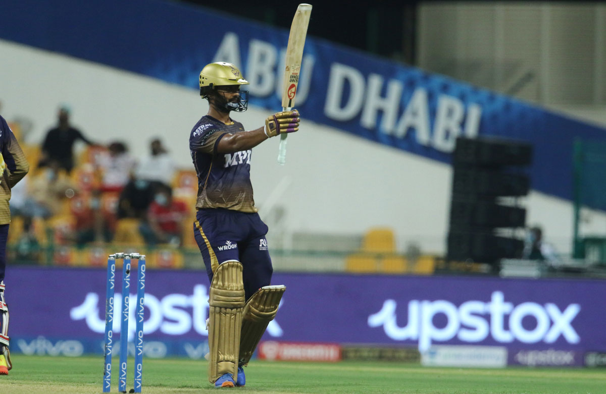 Rahul Tripathi raises his bat after completing 50.