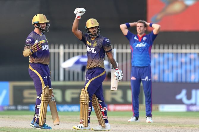 Nitish Rana, right, celebrates with Lockie Ferguson after hitting the winning runs for Kolkata Knight Riders in Tuesday's Indian Premier League match against Delhi Capitals in Sharjah.