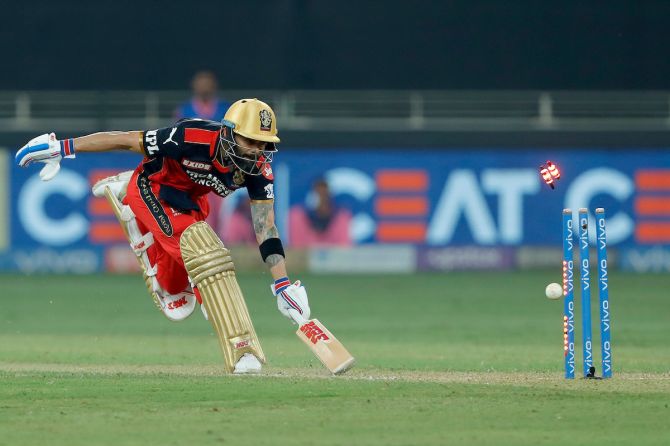 Virat Kohli is run-out at the non-striker's end from a direct throw by Riyan Parag.