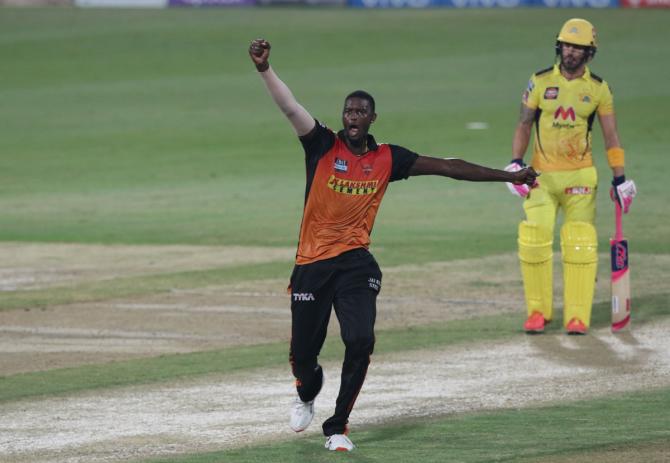 Sunrisers Hyderabad pacer Jason Holder celebrates the wicket of Suresh Raina.