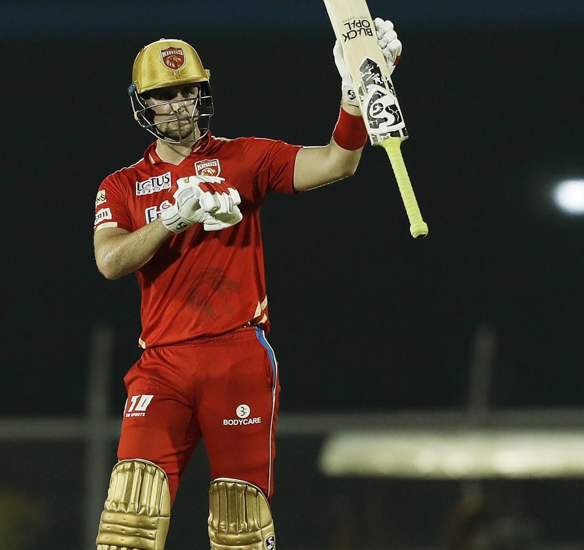 Punjab Kings' Liam Livingstone celebrates on completing his half-century against Gujarat Titans