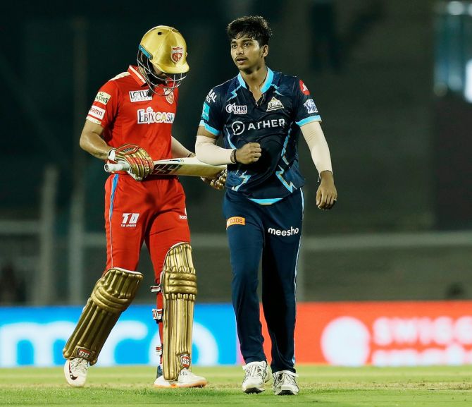 Debutant Darshan Nalkande celebrates on scalping the wicket of Jitesh Sharma 