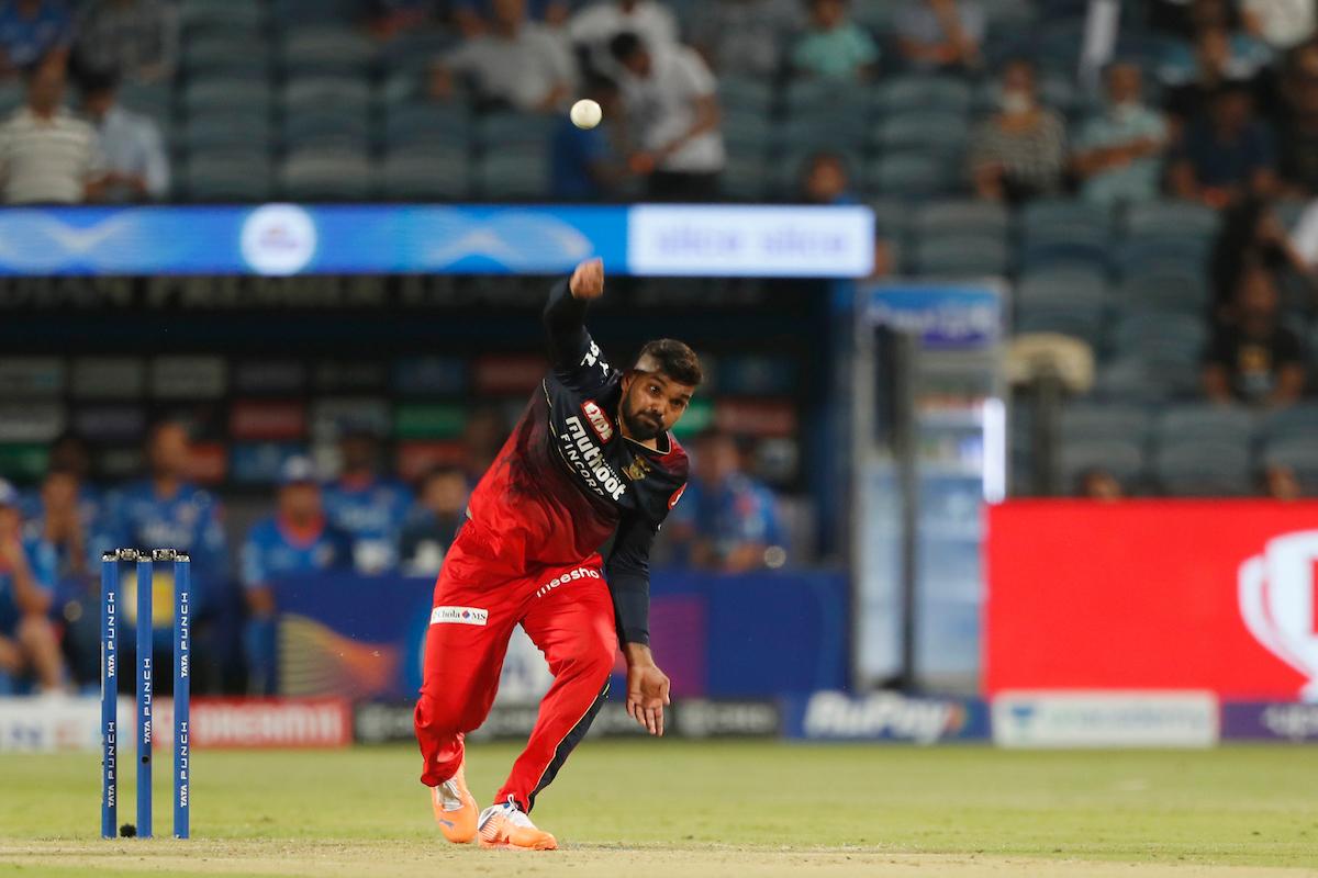 Royal Challengers Bangalore spinner Wanindu Hasaranga bowls during the Indian Premier League match against Mumbai Indians, at the MCA  Stadium in Pune, on Saturday.