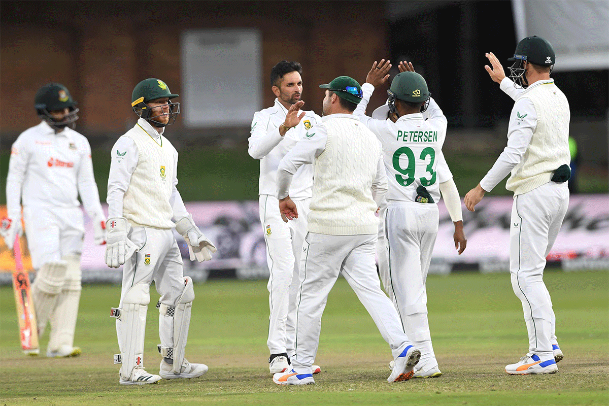 South Africa's Keshav Maharaj celebrates the wicket of Bangladesh's Litton Das